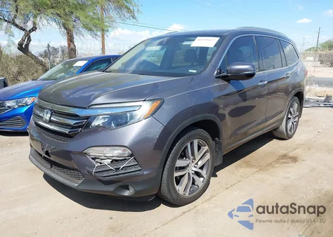2018 Honda Pilot Touring from USA, damaged, VIN 5FNYF5H99JB021983